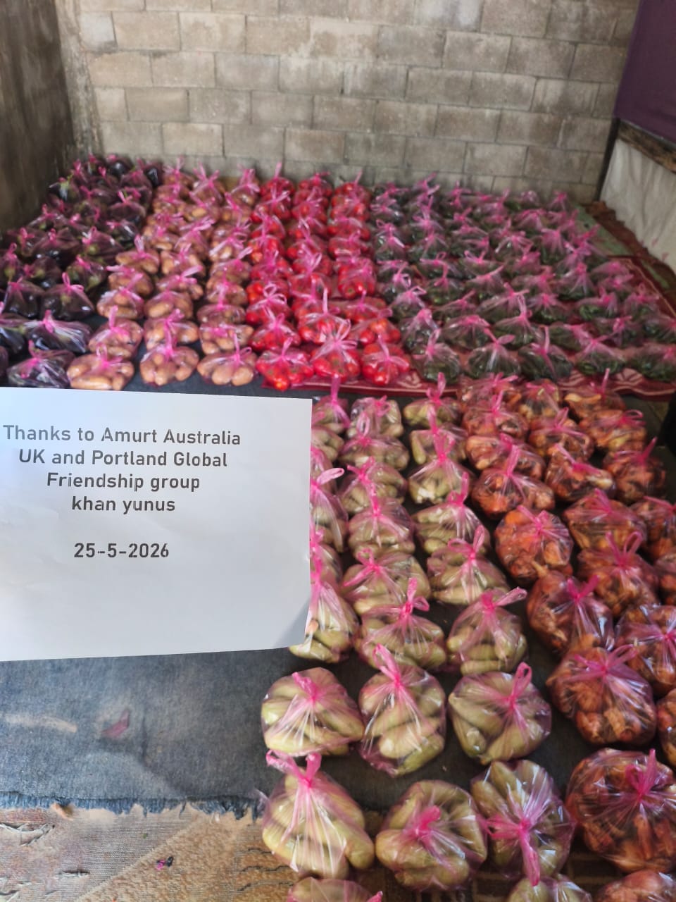 Fresh food distribution with thank you sign